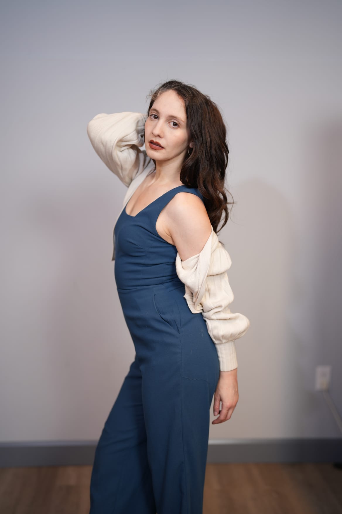 Lifestyle — teal jumpsuit, cardigan