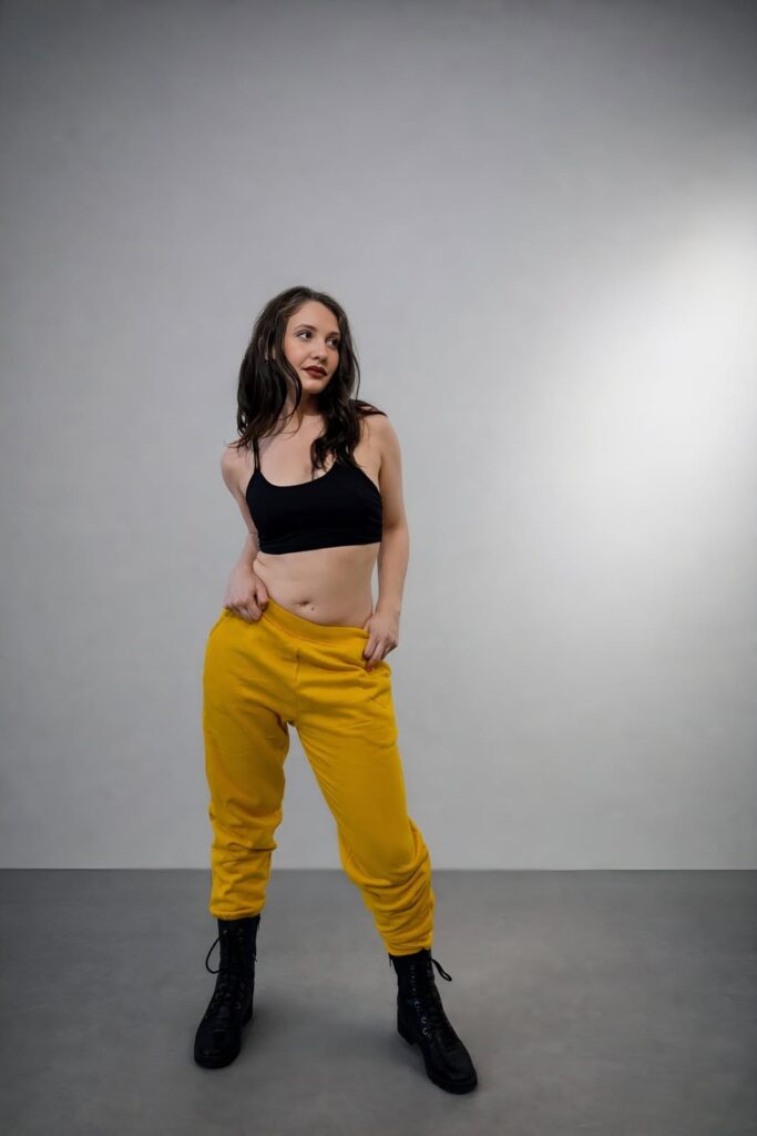 Studio — full body, yellow joggers
